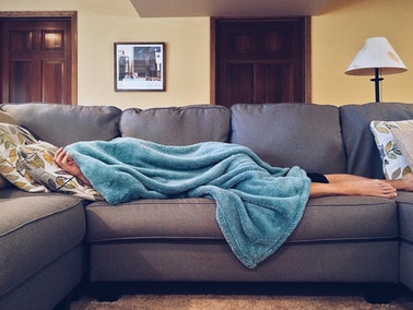 person lying on couch