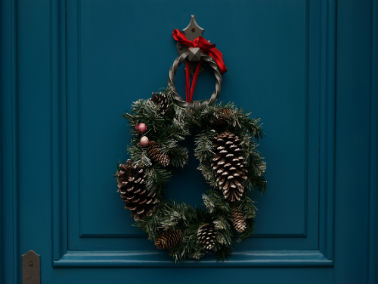 holiday wreath on blue front door