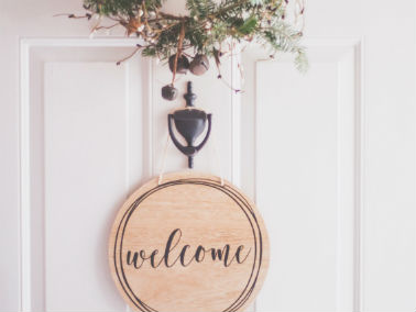 welcome décor on door