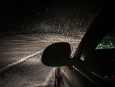 car driving at night during winter